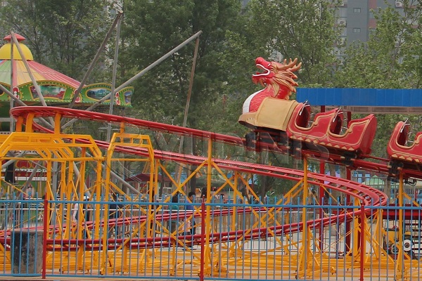 family roller coaster near park entrance